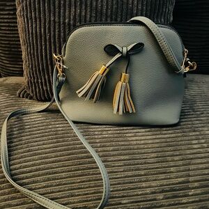 Blue Gray in color Crossbody Bag with Tassels